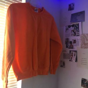 bright orange crew neck
